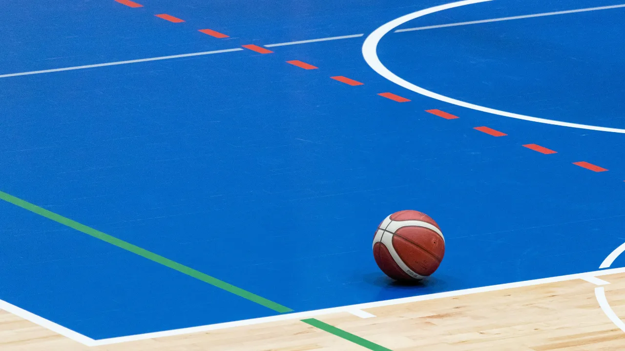 Size of half court basketball